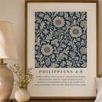 Framed floral design with 'Philippians 4:8' text on a wall above a wooden dresser.