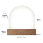 A sizing photo for a dome acrylic plaque
