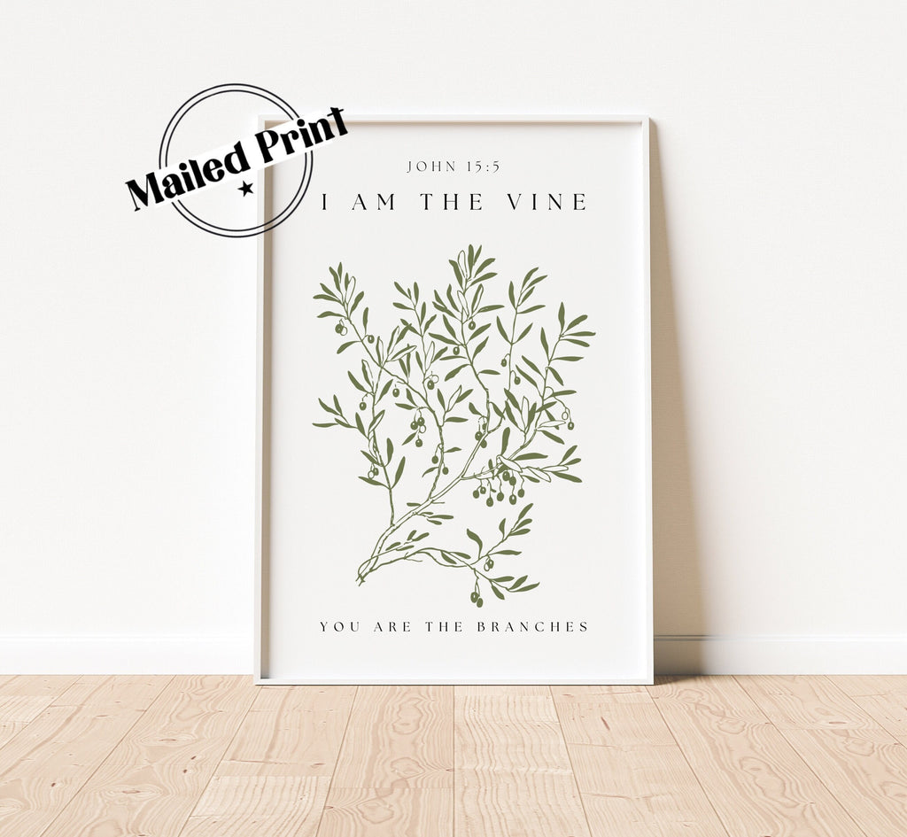 A white framed print with a green vine illustration and the text &#39;JOHN 15:5&#39;, &#39;I AM THE VINE&#39;, and &#39;YOU ARE THE BRANCHES&#39;.